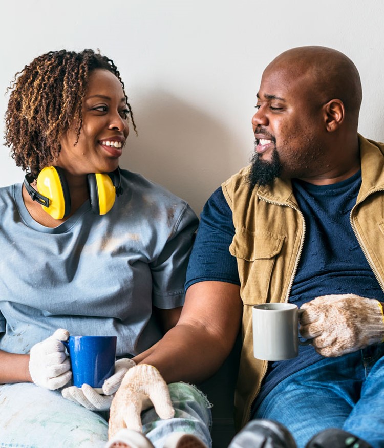 African American Male Construction Worker With Spouse